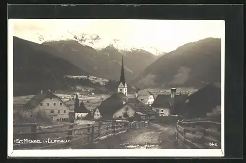 AK St. Michael /Lungau, Ortsansicht mit Kirche und Bergen