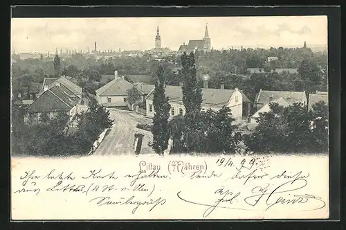 AK Littau b. Mähren, Strassenpartie mit Blick zur Kirche