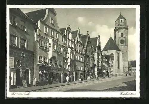 AK Donauwörth, Reichstrasse mit Geschäften und Kirche