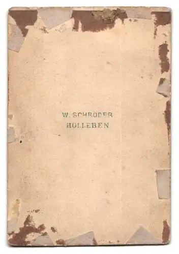 Fotografie W. Schröder, Holleben, Portrait Herr mit seinem kleinen Hund im Atelier