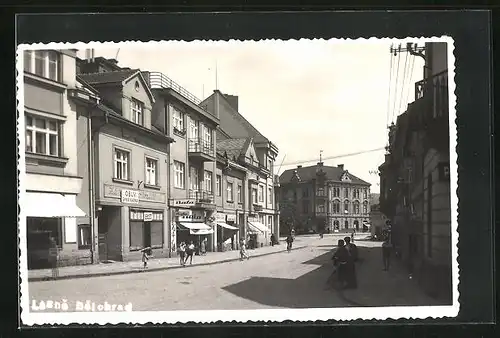 AK Lazne Belohrad, Strassenpartie mit Geschäften