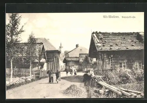 AK Alt-Wallern, Holzhäuser in der Bahnhofstrasse, Kirche