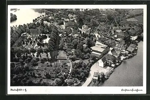 AK Reinfeld i. H., Fliegeraufnahme der Stadt mit Kirche