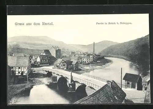 AK Brück b. Nideggen, Partie an der Brücke mit Fluss und Ort