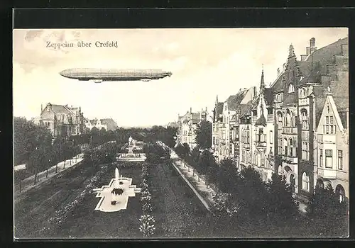 AK Crefeld, Zeppelin über der Stadt, Prachtstrasse