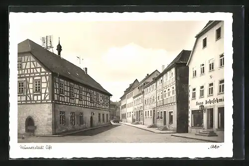 AK Münnerstadt, Strassenpartie mit Geschäften
