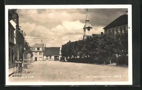 AK Lomnice n. Luz., Strassenpartie mit Kirche