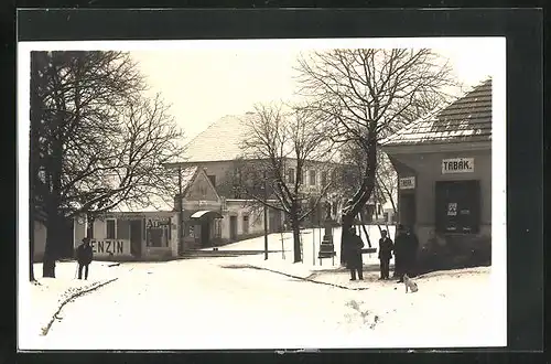 AK Zizelice n. Cidl, Strassenpartie mit Geschäften im Schnee