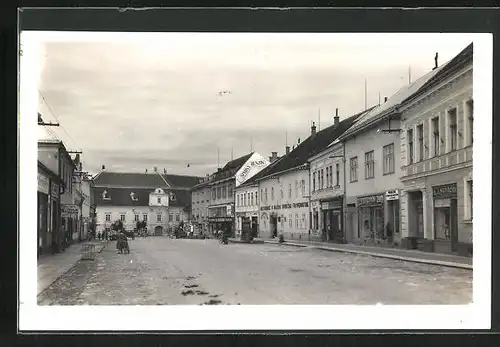 AK Mor. Budejovice, Strassenpartie mit Geschäften