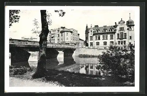 AK Nem. Brod, Uferpartie mit Brücke