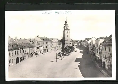 AK Velke Mezirici, Strassenpartie mit Kirche