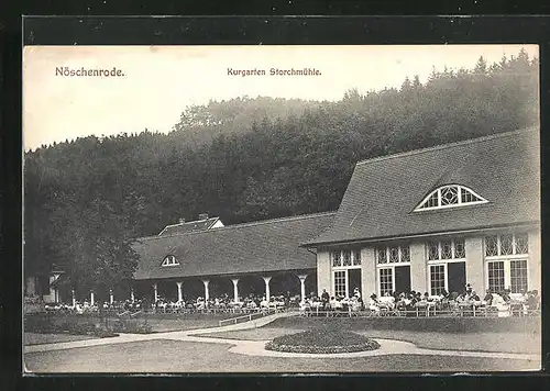 AK Nöschenrode, Kurgarten Storchmühle mit Gästen, Restaurant