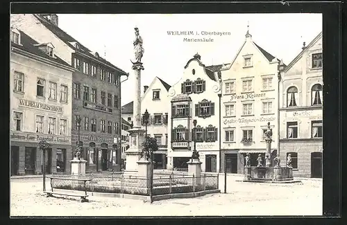 AK Weilheim i. Oberbayern, Platz mit Gasthof, Geschäften und Mariensäule