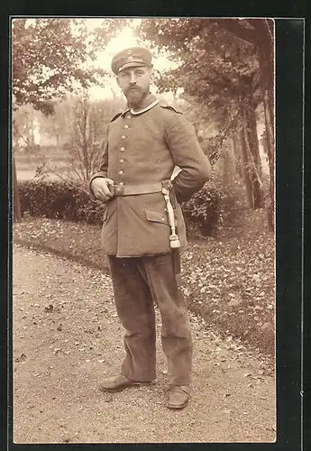 Foto-AK Uniformfoto eines Soldaten mit Portepee