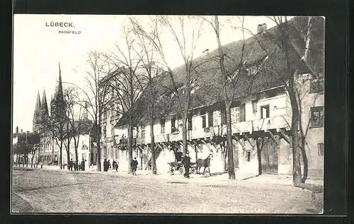 AK Lübeck, Strasse Reinfeld mit Kirche