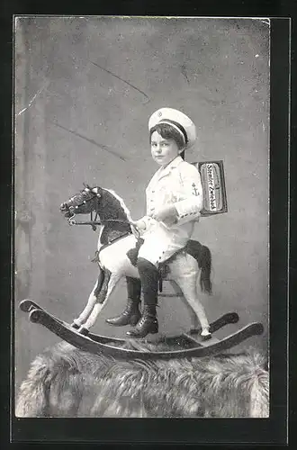Foto-AK Junge auf Schaukelpferd mit Karton, Reklame für Stemler-Zwieback