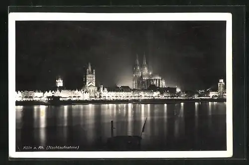 AK Köln, Panorama mit Dom bei nächtlicher Beleuchtung