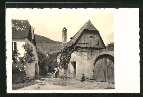 AK Ober-Arnsdorf, Ortspartie mit Torbogen