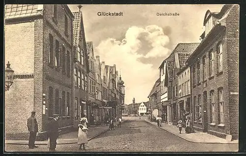 AK Glückstadt, Deichstrasse mit Geschäften