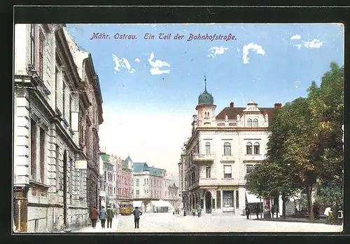 AK Mähr. Ostrau, Bahnhofstrasse mit Geschäften am Tag