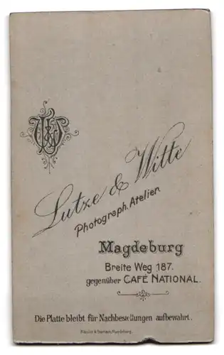 Fotografie Lutze & Witte, Magdeburg, Breite Weg 187, Portrait Knabe mit niedlichem Baby