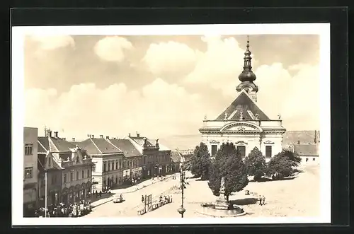 AK Uhersky Brod, Strassenpartie mit Kirche