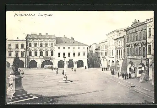 AK Neutitschein, Stadtplatz mit Geschäften u. Hotel Schuster