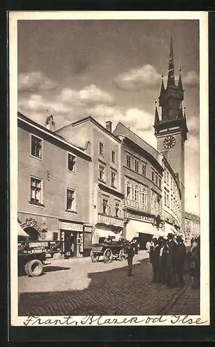 AK Znojmo, Strassenpartie mit Geschäft v. A. Pfeiffer