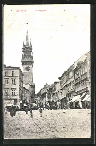 AK Znaim, Strasse Füttergasse mit Geschäften