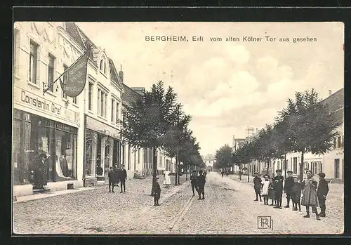 AK Bergheim /Erft, Strassenpartie vom alten Kölner Tor aus gesehen, Geschäft Constantin Graf