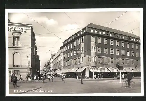 AK Köln-Mülheim, Buchheimerstrasse mit Verkehrspolizist