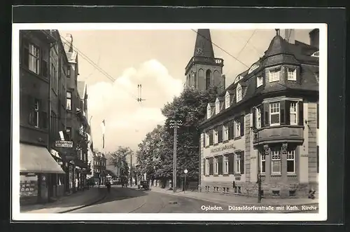 AK Opladen, Düsseldorferstrasse mit Kath. Kirche