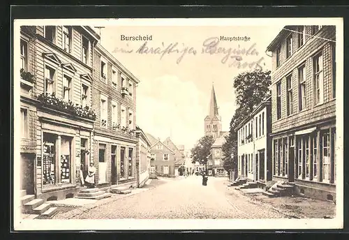 AK Burscheid, Hauptstrasse mit Geschäften und Kirche