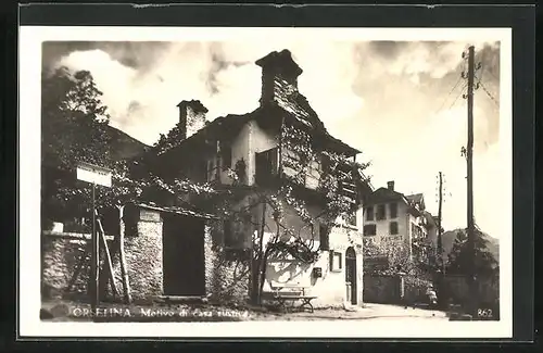 AK Orselina, Motivo di casa rustica