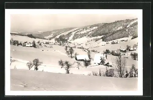 AK Gross Karlowitz, Blick auf den eingeschneiten Ort im Tal