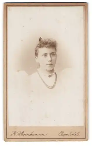 Fotografie H. Brinkmann, Osnabrück, Johannisstrasse 68, Portrait junge Dame mit zurückgebundenem Haar