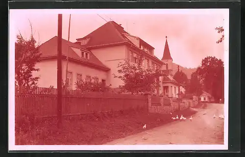 AK Rusava, Strassenpartie mit Kirchturm