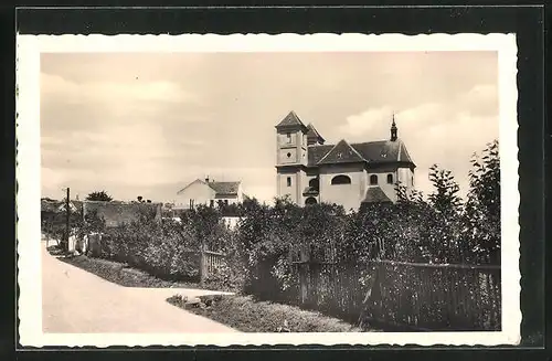 AK Pozorice, Strassenpartie mit Kirche