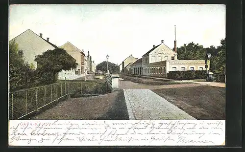 AK Gaya-Kyjov, Bahnhofstrasse mit Fabrik
