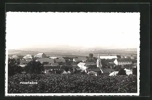 AK Podbrezice, Kirche in Teilansicht des Ortes