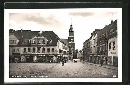 AK Oederan i. Sa., Strassenpartie an der Gr. Kirchgasse mit Geschäften