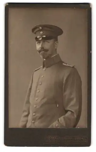 Fotografie Lorenz, Güstrow, Pferdemarkt 24, Pierre mit freundlichen Lächeln, Stabsarzt