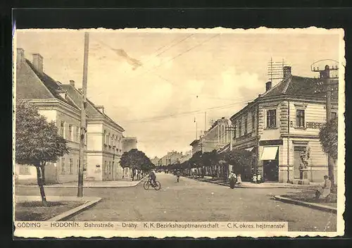 AK Göding / Hodonin, Bahnstrasse u. K. K. Bezirkshauptmannschaft