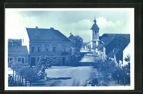AK Kunovice, Strassenpartie, Blick zur Kirche