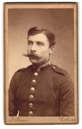 Fotografie J. Baur, Colmar, Bäckerstrasse 10, Portrait Soldat in Uniform mit Schnauzbart
