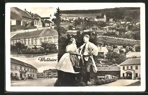 AK Mutenice, Strassenpartie mit Gasthaus, Strassenpartie mit Gebäudeansicht, Paar in Tracht