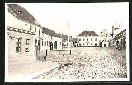 Foto-AK Prossmeritz, Platz mit Metzgerei