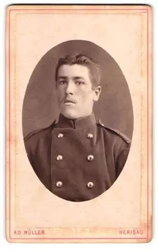 Fotografie Ad. Müller, Herisau, Casernenstrasse: z. Papagei, Junger Soldat in Feldgrau