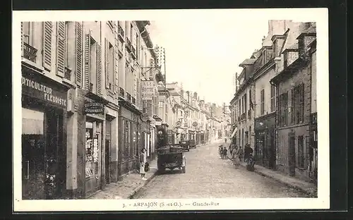 AK Arpajon, Grande-Rue, A la Botte Rouge