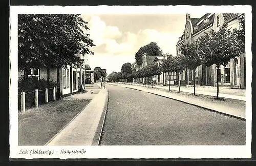 AK Leck /Schleswig, Hautpstrasse mit Drogerie